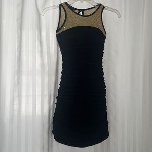 Un Deux Trois Black Dress with Gold Sequin Detail